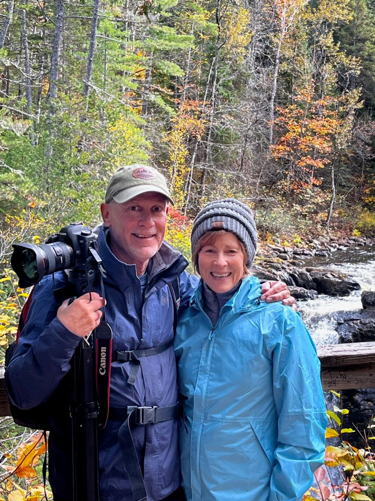 The photographer and his wife at Moxie Falls in Maine.