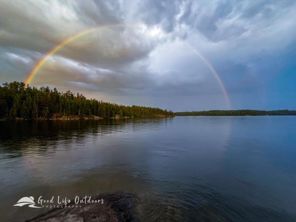 A full rainbow in the Boundary Waters Canoe Area Wilderness along the Minnesota-Canada border.